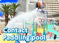 Heartily enjoying a water play system, such as the water of the jungle gym !